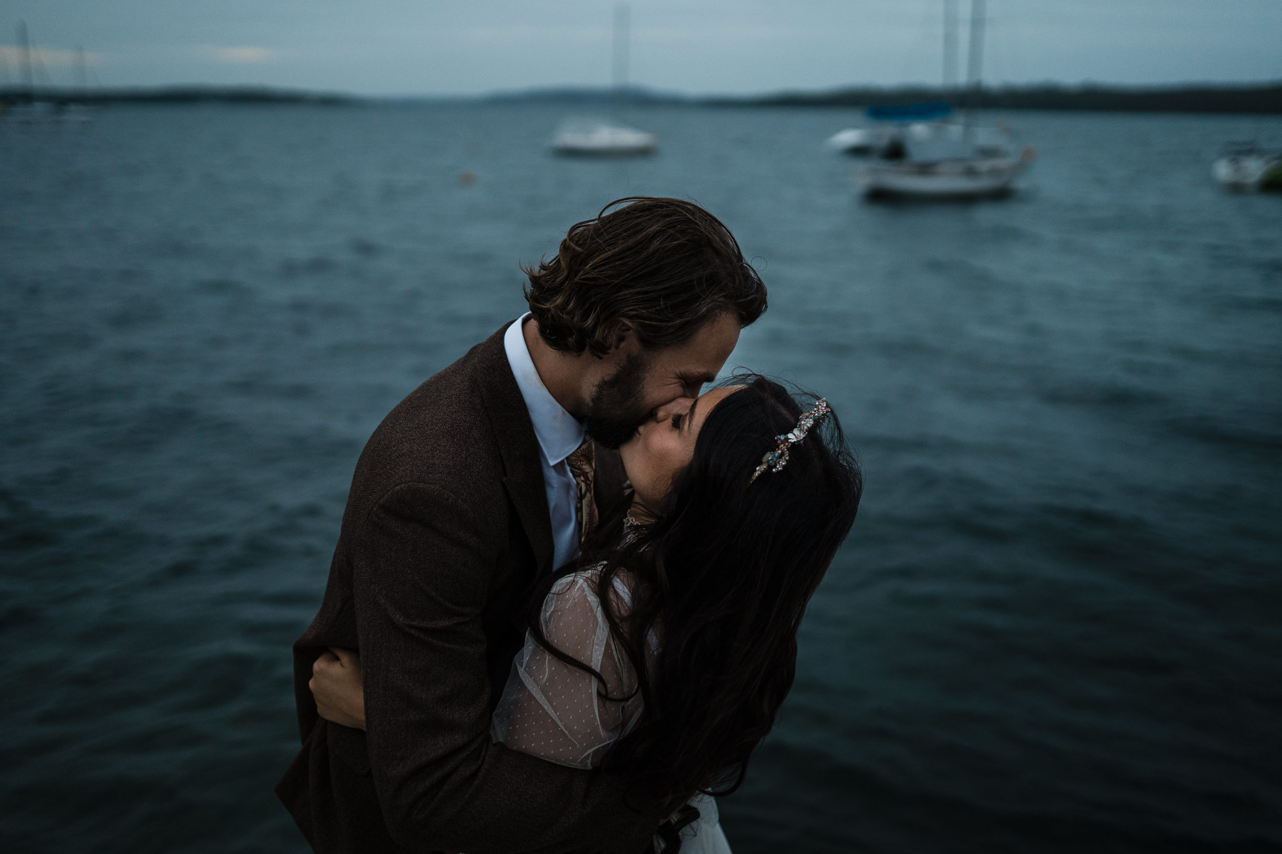 bride and groom share an intimate kiss for their wedding film