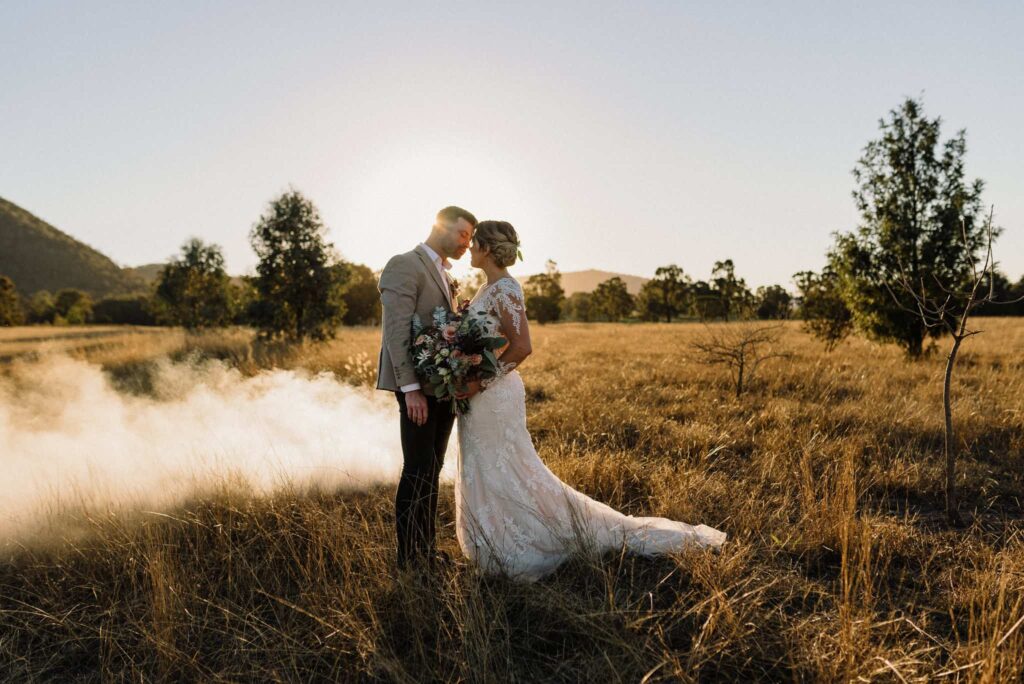 Bride and groom elope in Australia in gorgeous sun drenched field 