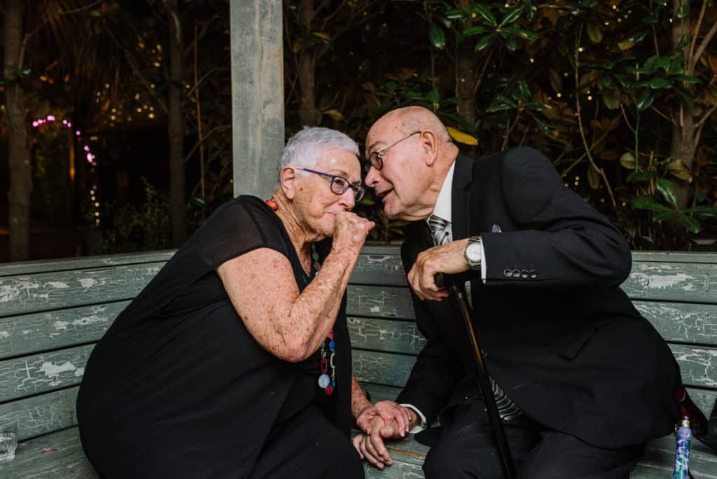 grandparents talking during wedding reception captured by james white photography