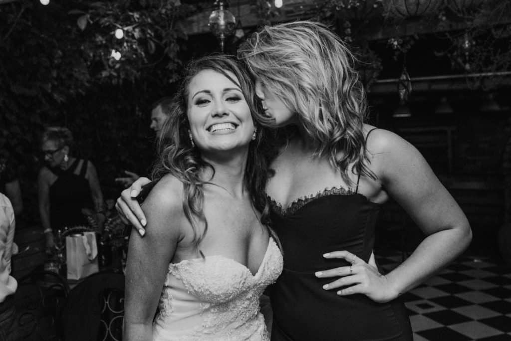 bride and sister at wedding reception on dancefloor captured by james white photography
