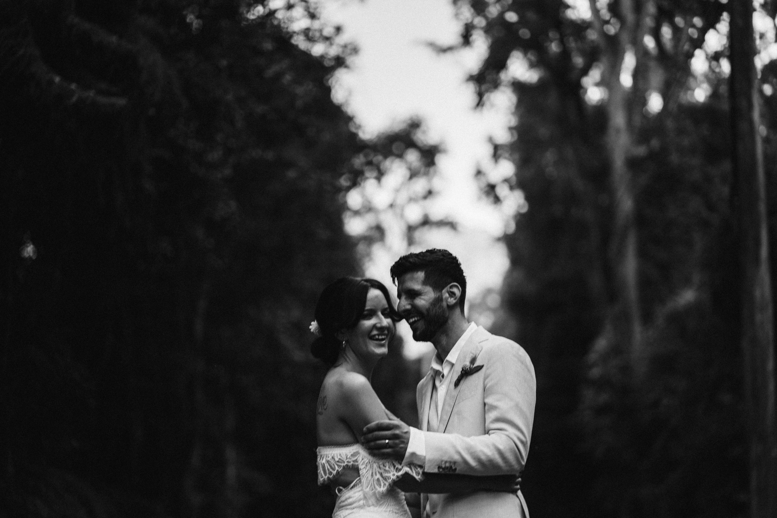 bride and groom dancing in epic black and white intimate wedding film