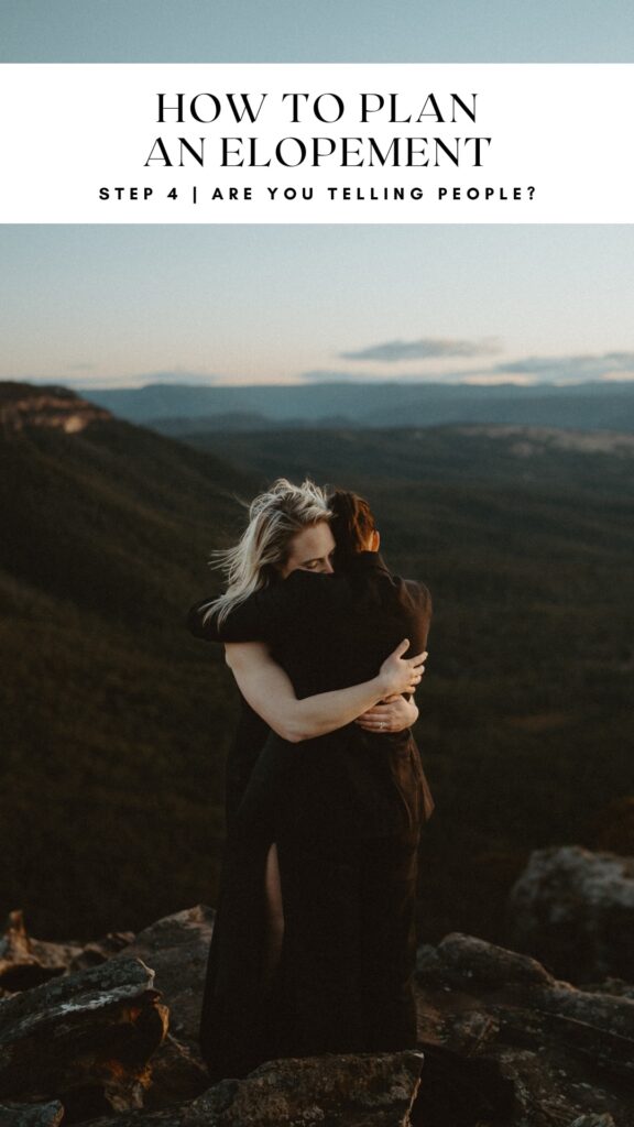 Two brides embracing on the cliffs in the Blue Mountains at sunset. Both brides wearing black. 